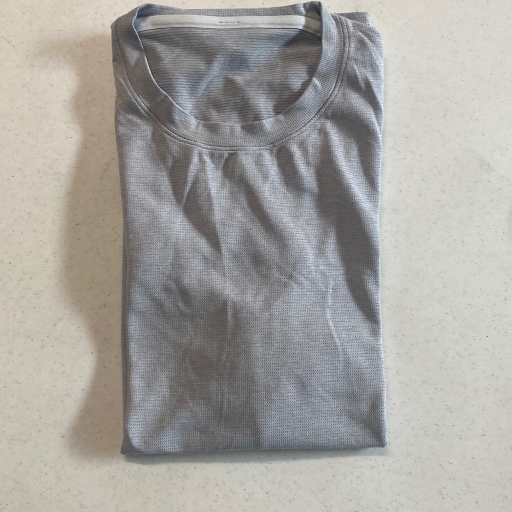 Lululemon men’s light gray, running shirt with reflective stripe on hem - Large